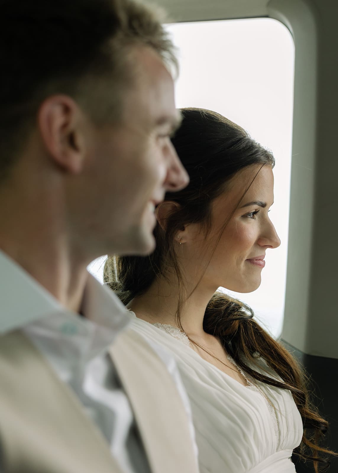 Bride and groom in a car 